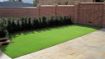 Lido Plus 30mm artificial grass installed in a residential garden, providing a lush, maintenance-free lawn suitable for children and pets